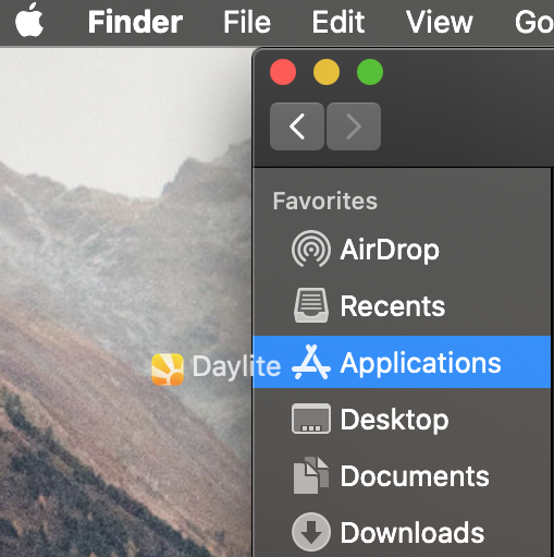 In Finder draging Daylite from the Downloads folder to the Applications folder
